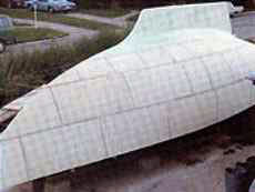 Boat building in foam sandwich - laying the outer skin